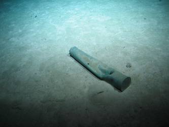 Compressed 4-inch shell casing